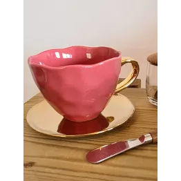 Soucoupe de tasse dorée