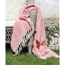 Atout charme pour ce plaid rose en coton